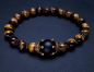 Preview: Tiger eye pearl bracelet with gold-colored lion head